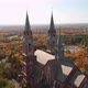 Catholic Church on hillside overlooking fall colored trees in Wisconsin - VideoHive Item for Sale