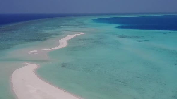 Aerial drone sky of resort beach time by blue lagoon with sand background