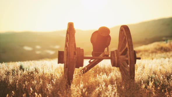 Historic War Gun on the Hill at Sunset