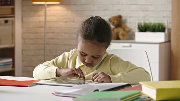 Girl Playing on Tablet