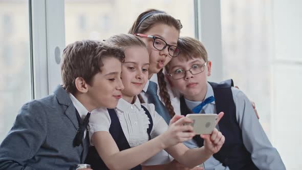 Happy School Friends Taking Selfies