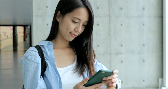 Woman looking at mobile phone 