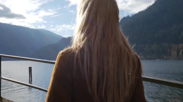 Female Walking Along Nelson Waterfront on a Beautiful Fall Day