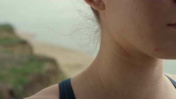 Calm Face Woman Meditating on Beach Closeup