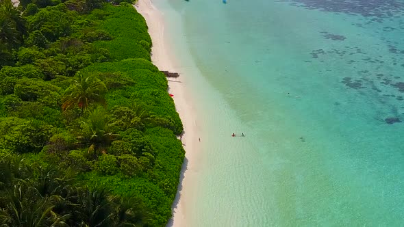 Drone view texture of island beach by blue sea with sand background