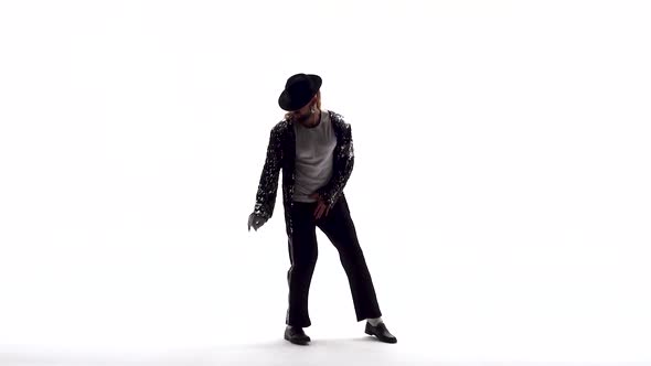 Young Stylish Teenager Is Showing Dance Moves Like Michael Jackson. Isolated Over White Background.