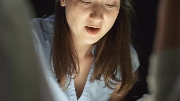 Cheerful Woman Teaching Sand Animation Class