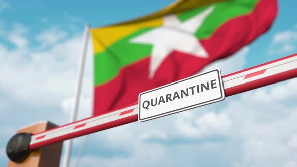 Opening Boom Barrier with QUARANTINE Sign at Flag of Myanmar alt