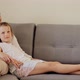 Smiling Mature Woman Embracing Daughter at Couch - VideoHive Item for Sale