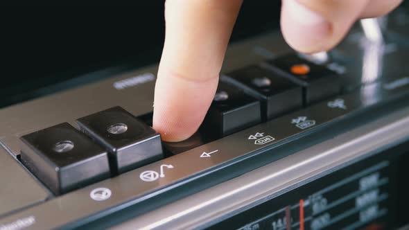 Pushing Play Button on a Vintage Tape Recorder. Transistor Retro Radio.