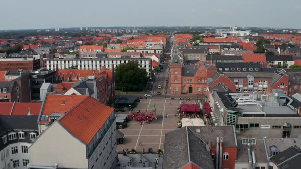 Aerial Dolly Over the Famous Torvet Square in Esbjerg Denmark with Town Hall and the Statue of