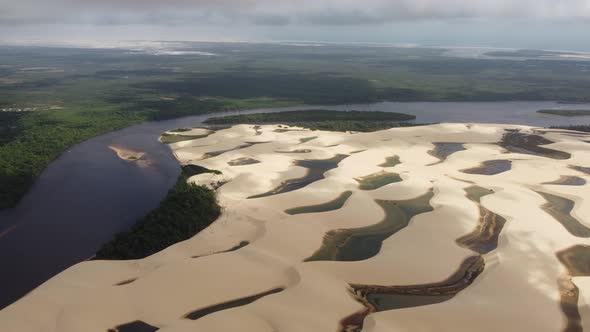 Sand dunes and rain water lagoons at northeast brazilian paradise