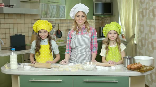 Female Chef and Children Smiling.