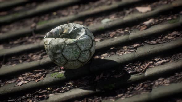 Old Soccer Ball on the Roof of a House