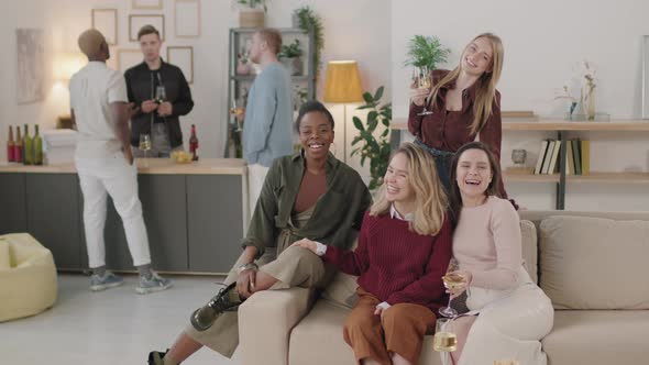 Happy Women Laughing at House Party