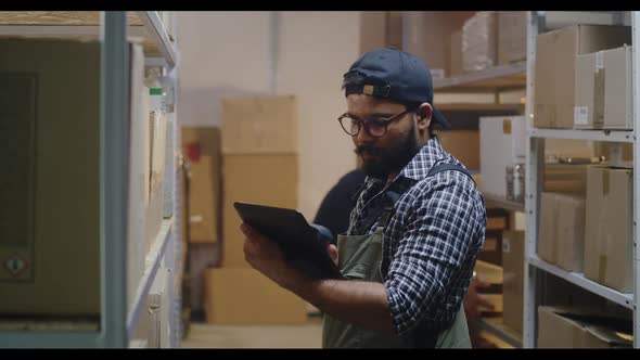 Young Man Working in Distribution Center