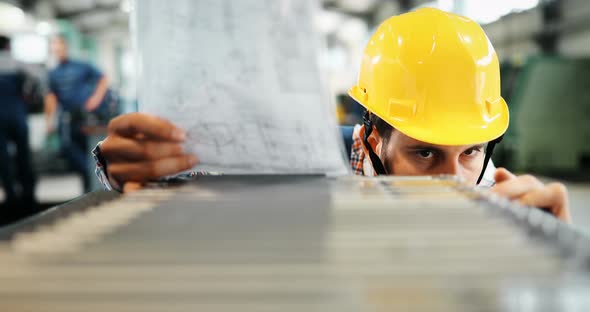 Supervisor Doing Quality Control and Pruduction Check in Factory