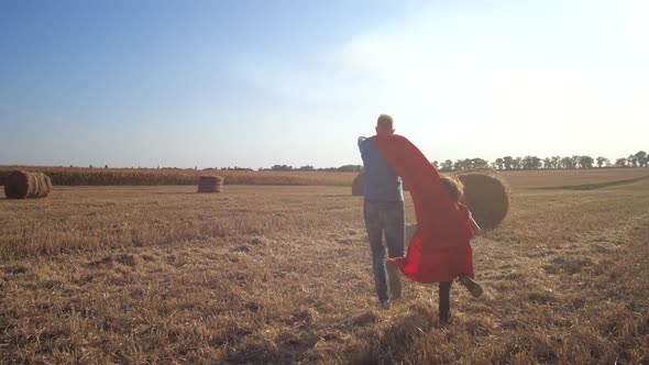 Dad and Son As Brave Superheroes Rushing To Rescue