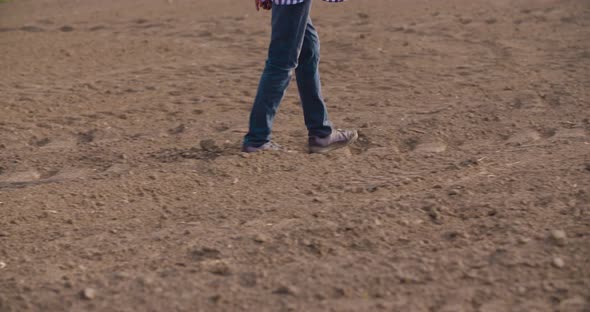 Farmer Walking on Farm