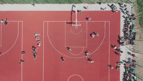 Aerial View of a Player Throwing the Ball Into the Basket