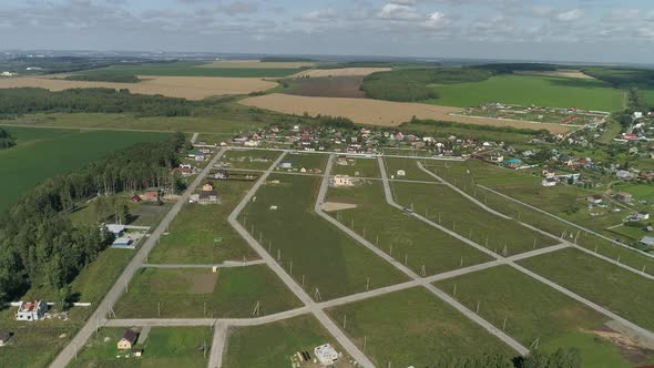 Aerial view of Start of construction in a new cottage settlement 15