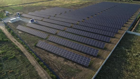 Solar Panels in the Field Long Rows Solar Power Station in Construction / Videohive, Stock footage, Industrial