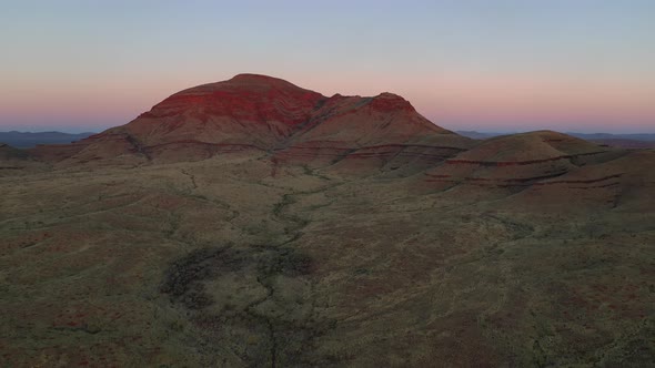 Summit of Mt Bruce, Karijini National Park, Western Australia Sunrise Sunset 4K Aerial Drone