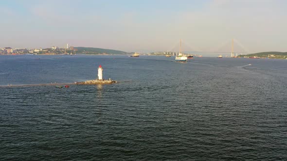 Tokarevsky Lighthouse with Tourists Sunny Bosphorus East and Russian Bridge