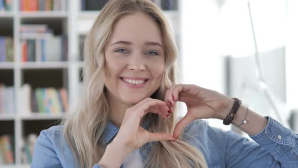 Handmade Heart Shape By Young Woman