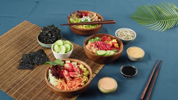 Cooked Poke Bowls Served with Sliced Vegetables Fish and Greenery Dried Seaweed