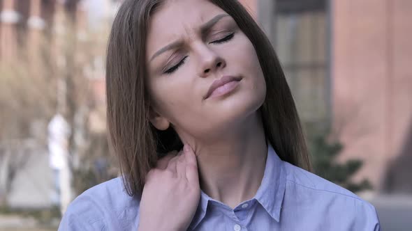 Tired Woman Trying to Relax Body By Stretching Outdoor