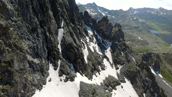 Aerial High Rocky Cliff Peak