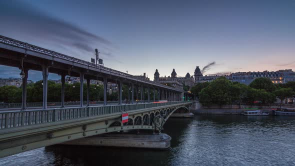 View of Pont De BirHakeim Day to Night Timelapse  a Bridge That Crosses the Seine River