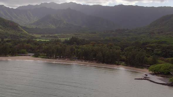 Push over ocean and shore and onto land in Oahu, Hawaii.