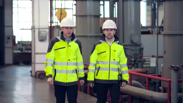 Two Engineers at an Industrial Plant