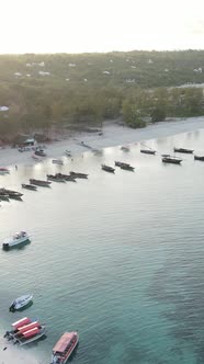 Vertical Video Boats in the Ocean Near the Coast of Zanzibar Tanzania