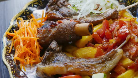 Bonein Beef Meat with Vegetables on a Plate