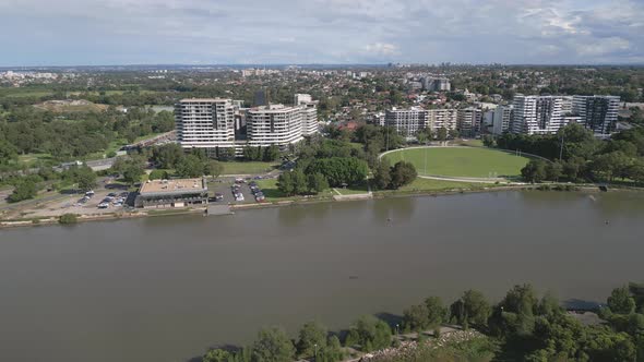 Aerial drone shot over Cooks River in the suburb of Sydney, Australia