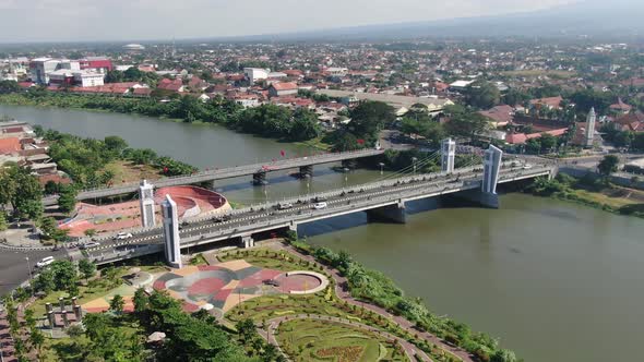 Modern Brawijaya bridge over Brantas river in Kediri, Java, Indonesia, aerial