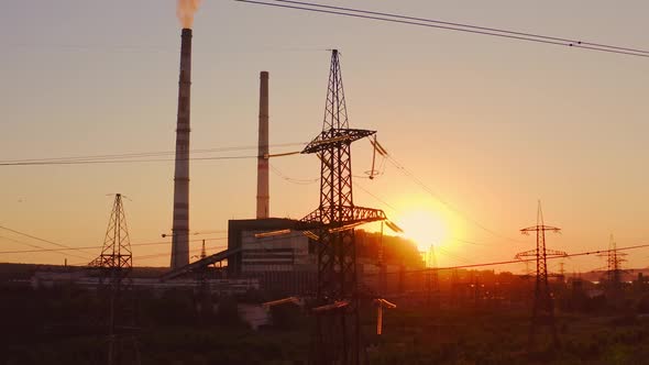 Electricity pylons at sunset