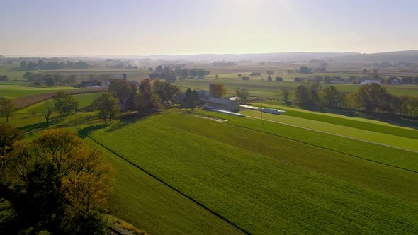 View on a Misty Morning Over the Farmlands at Sunrise