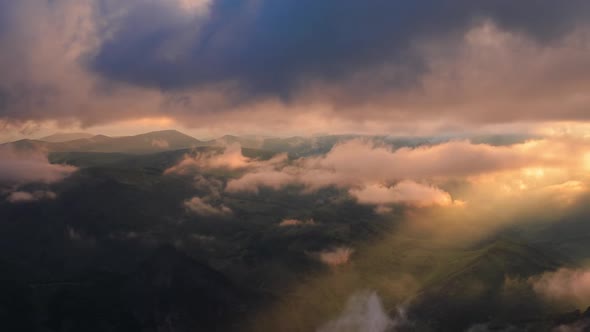 Low Clouds Over a Highland Plateau in the Rays of Sunset