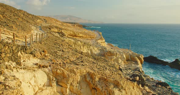 Narrow Pathway Along Ocean