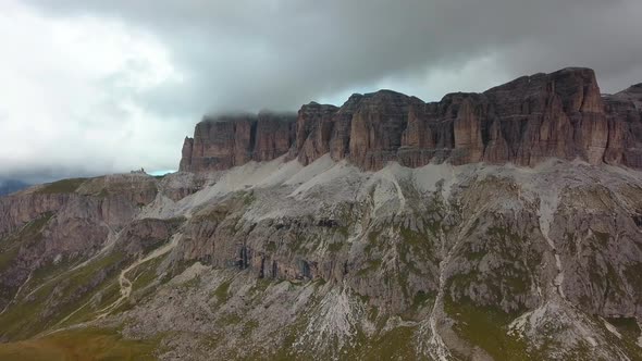 Rock formation top in the Dolomite mountain area in northern Italy on an overcast winter day, Aerial