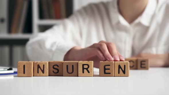 Agent Girl Hands Stacks Cubes Symbol Text Sign Insurance. Human Life Insurance