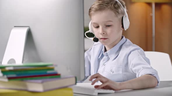 Boy Playing on Computer alt