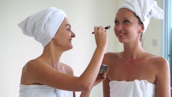 Beautiful Woman Having a Facial Treatment at Spa