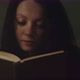 Woman Reading A Book. Close-up. - VideoHive Item for Sale
