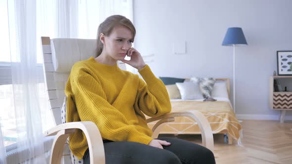 Headache Tense Upset Woman Sitting on Casual Chair