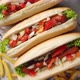 Assortment of Three Tasety Hot Dogs Placed on Wooden Cutting Board - VideoHive Item for Sale